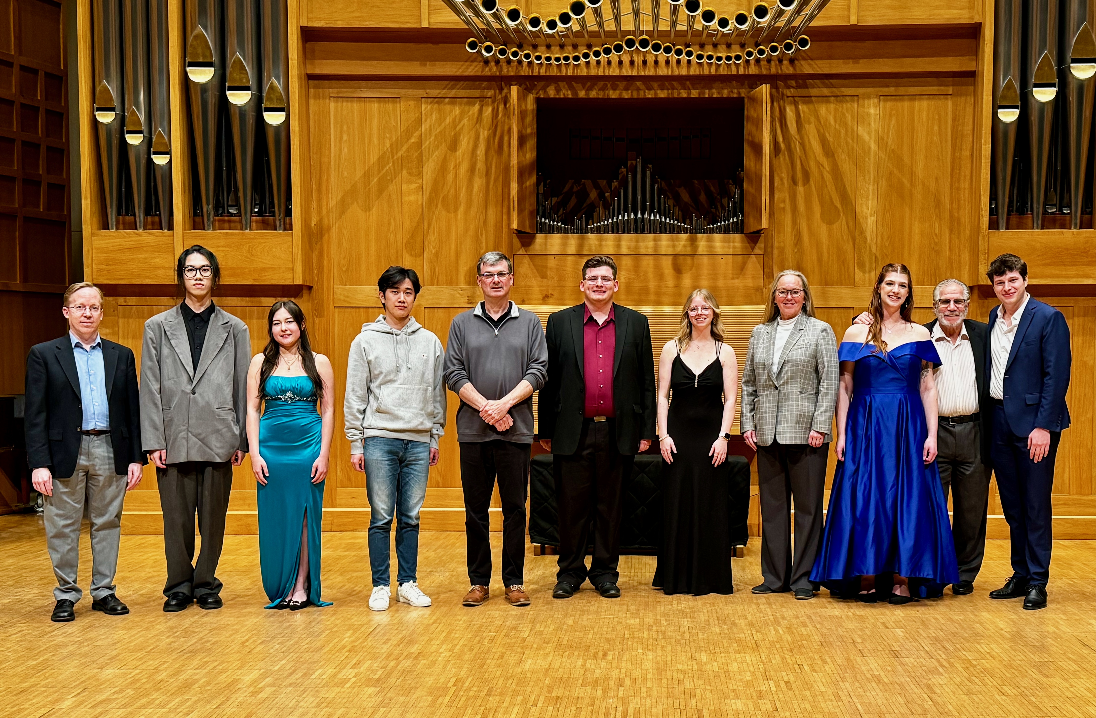 An image of the finalists from the 2024 competition, standing in front of WSU's marcussen organ