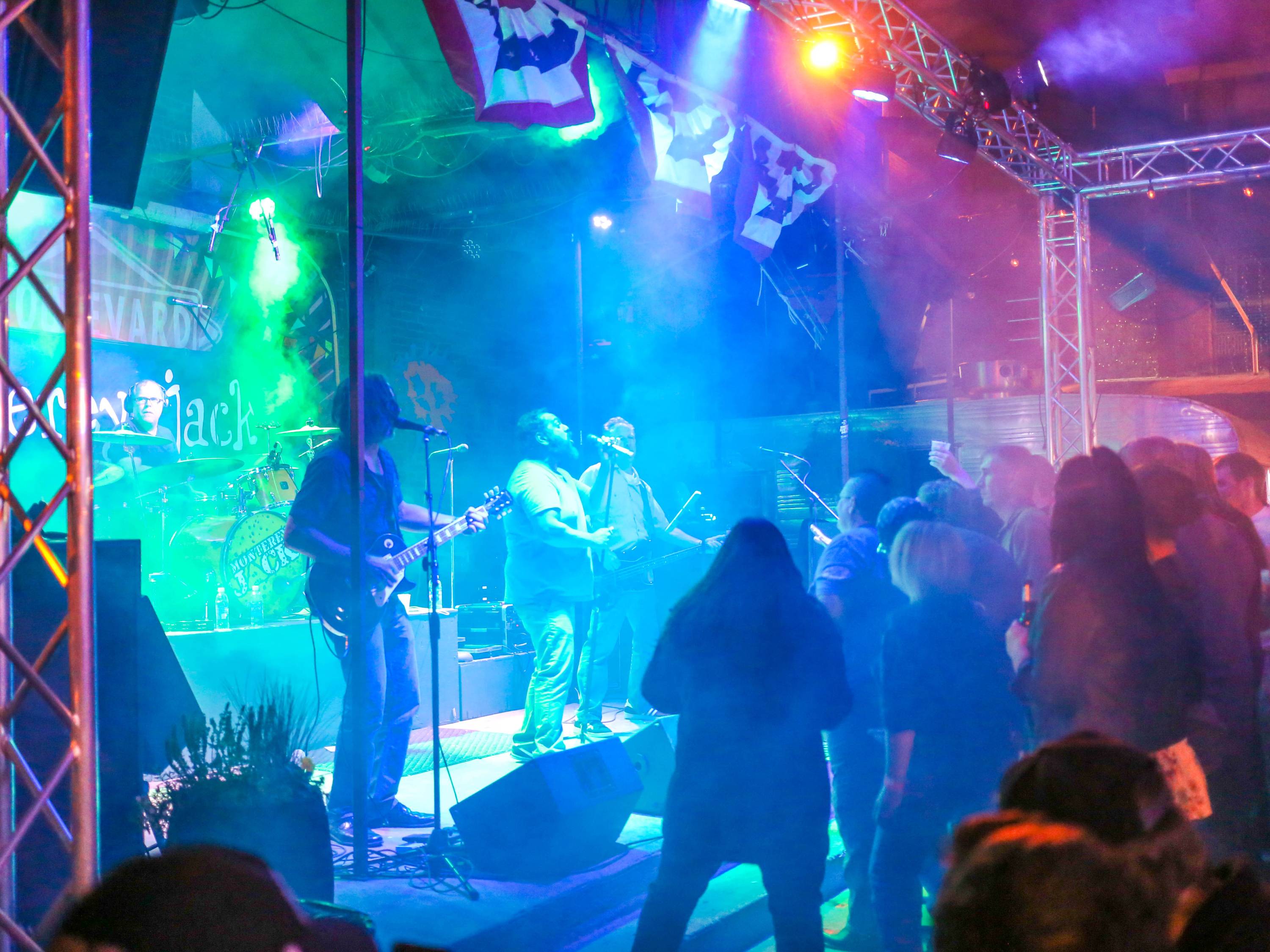 Crowd enjoying a live music performance in Wichita's Old Town district.