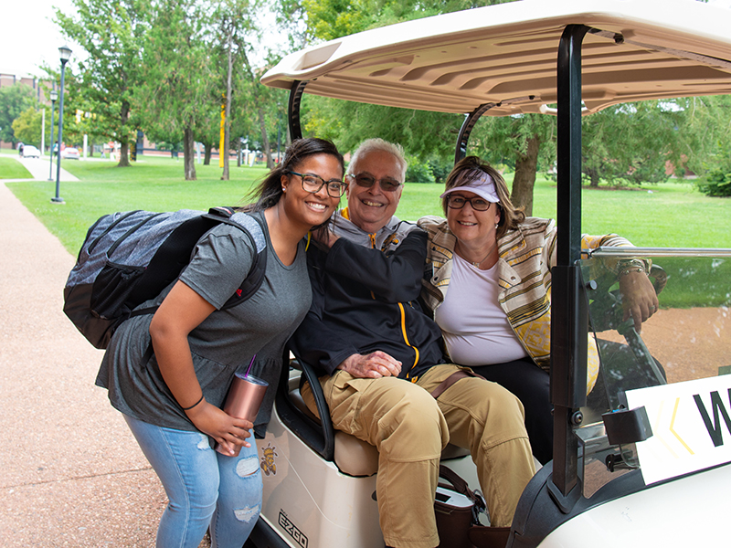 Wuber rides with Teri Hall and President Bardo