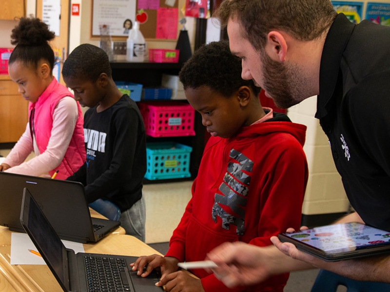 Kids working on computers