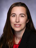 portrait of Ashley Haynes smiling at the camera