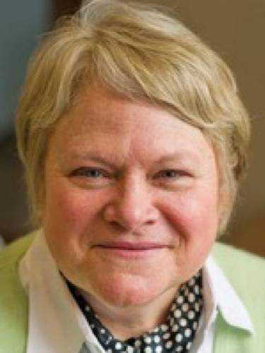 portrait of Ginger Breedlove smiling at the camera