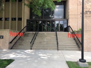 Side triangular walls marked “here” are part of the project canvas