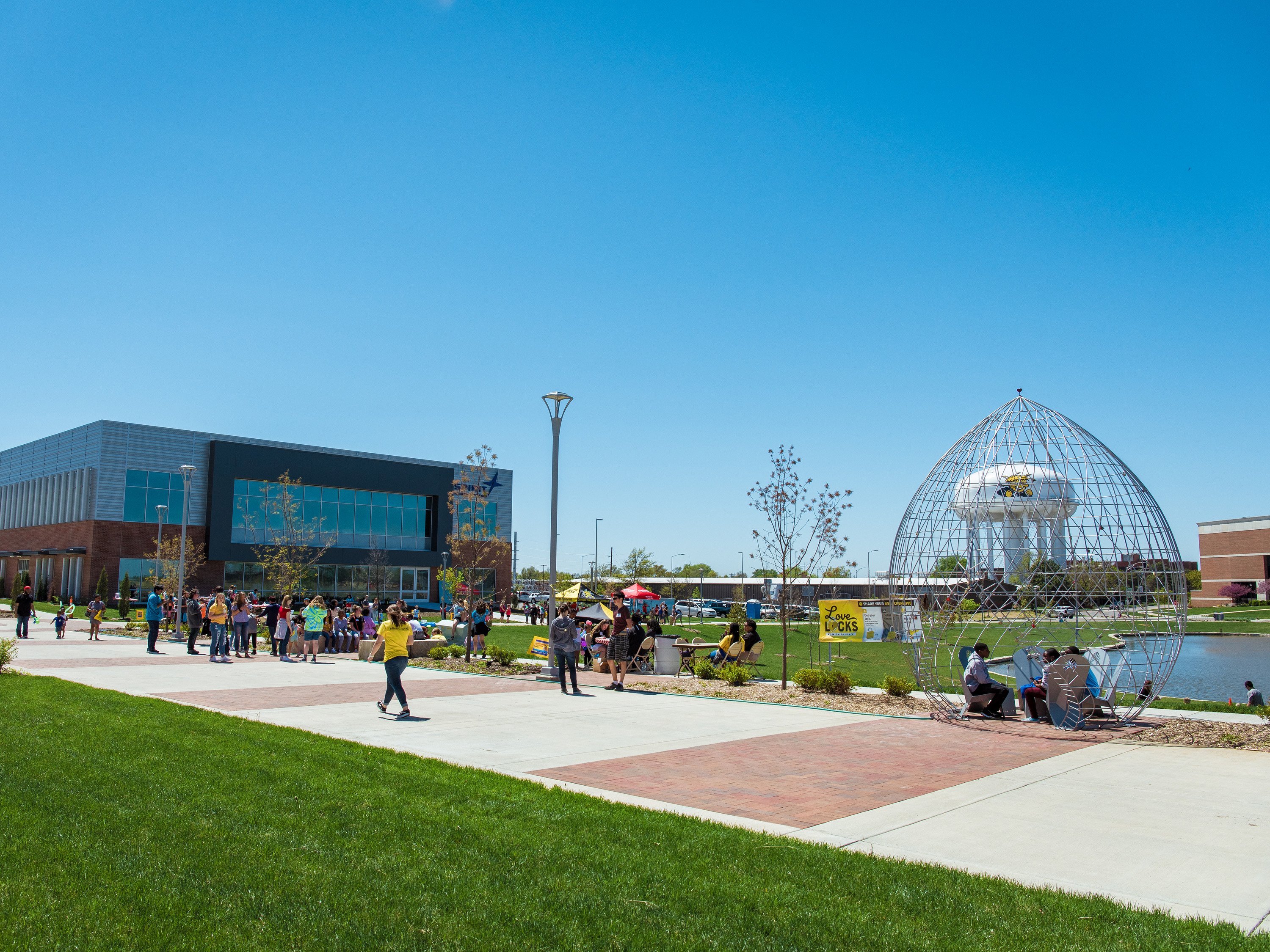 Event attendees at the Innovation Campus pedestrian mall