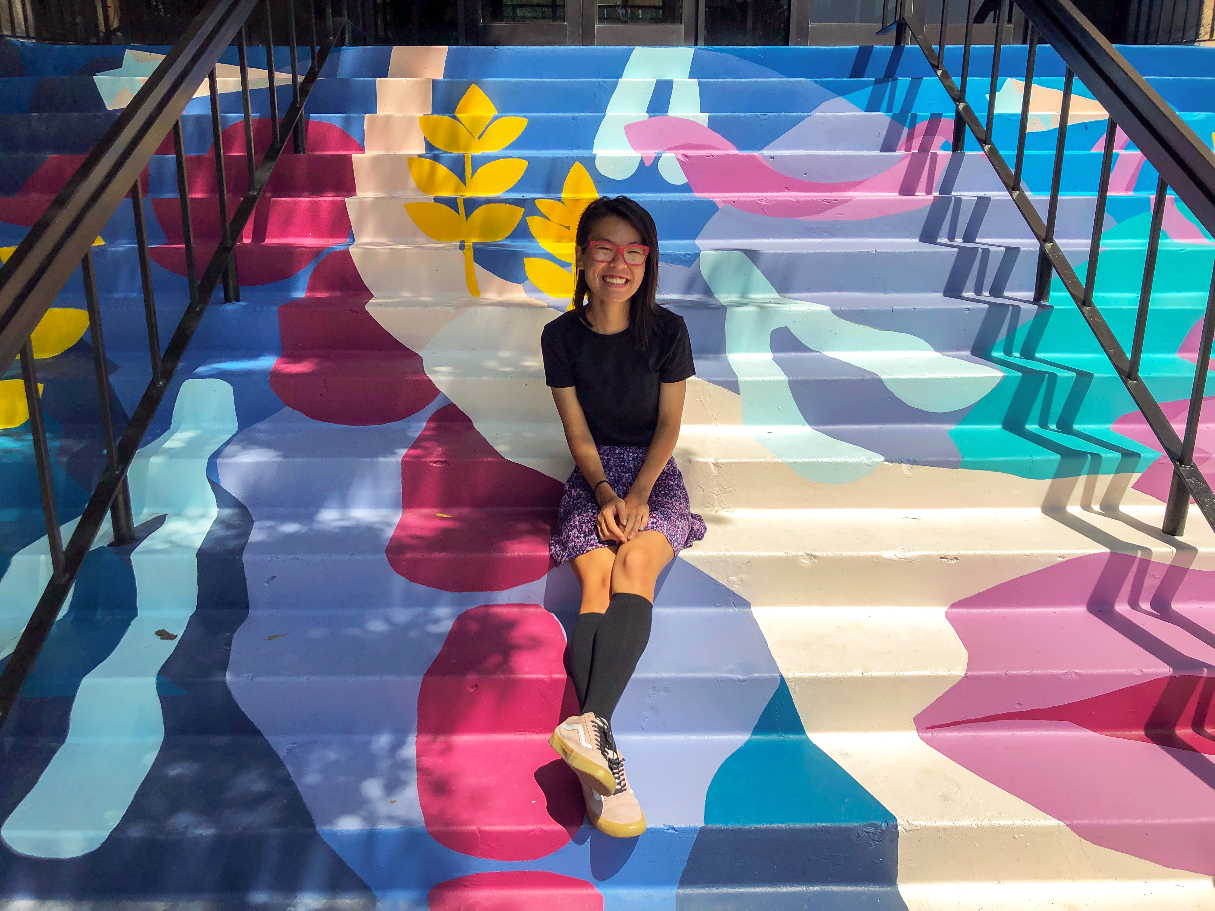 Sarah Myose's mural "Dreams and wishes" on the stairs of Clinton Hall