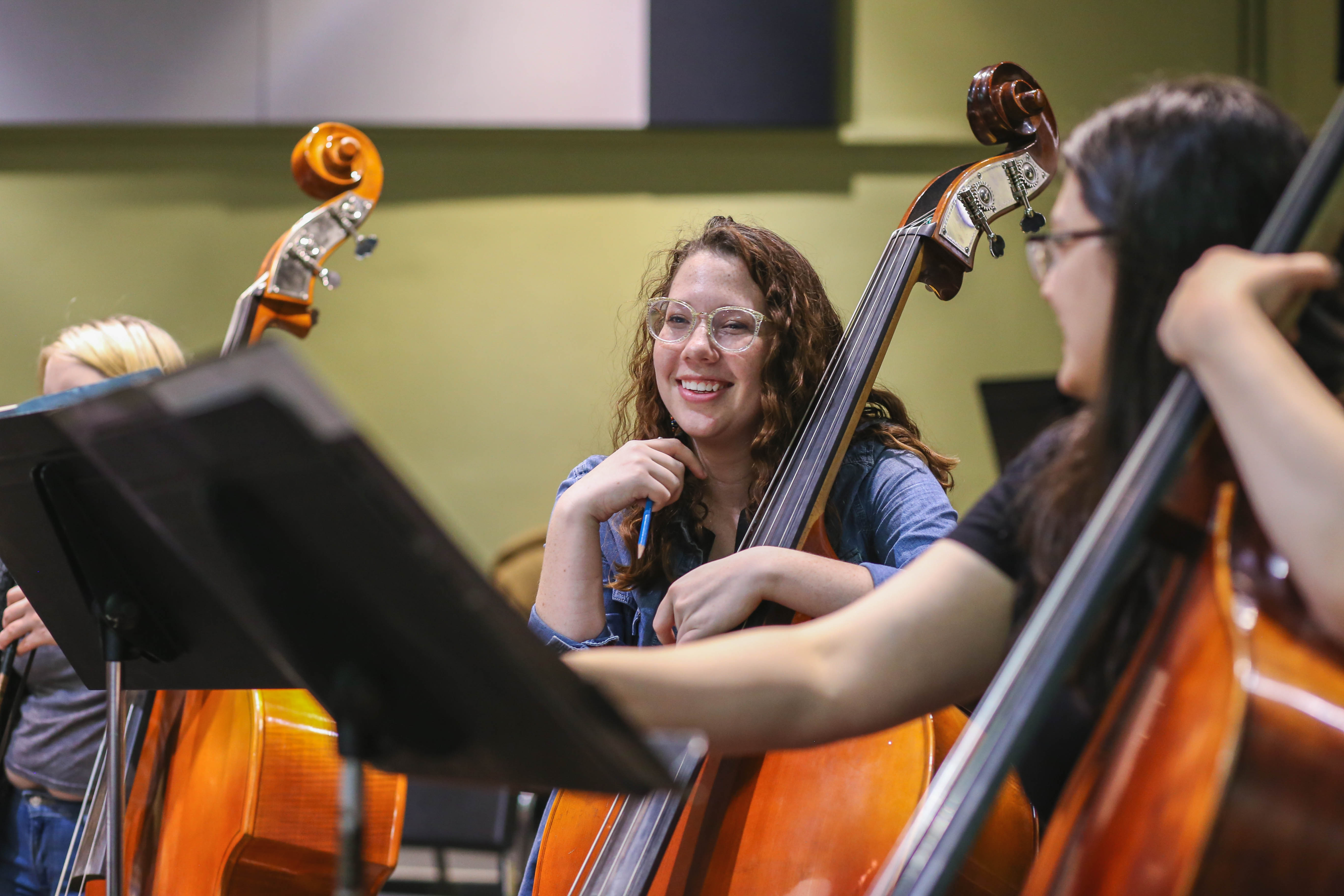 A student plays in an orchestral ensemble