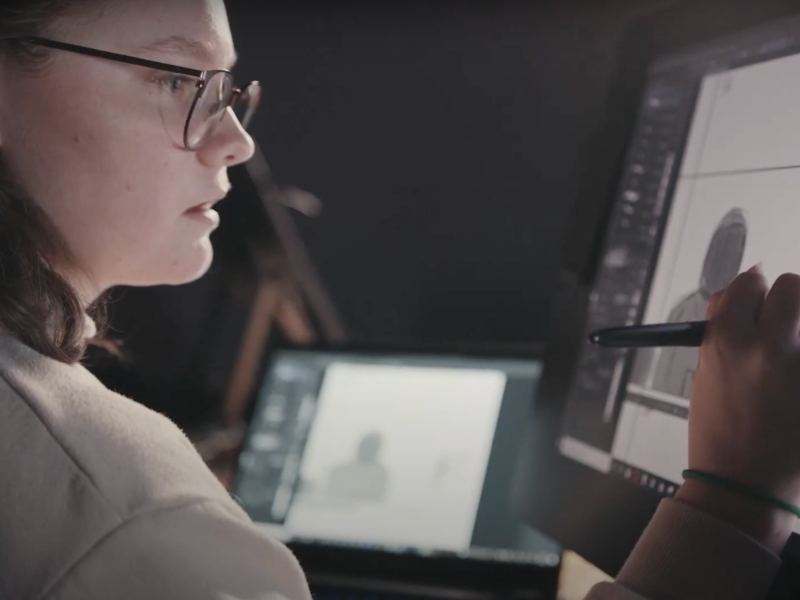 Woman working on screen