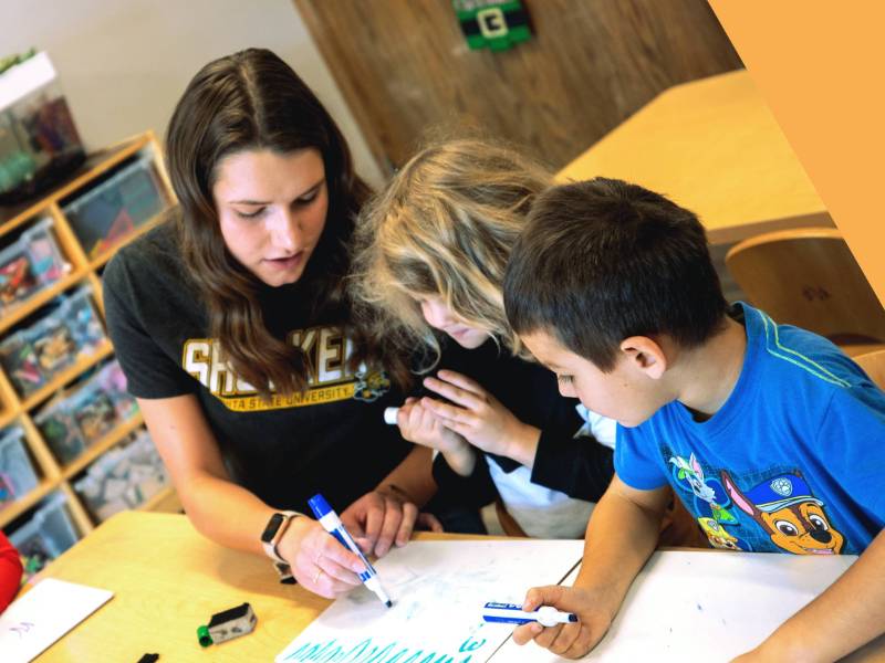 Student teacher with kids