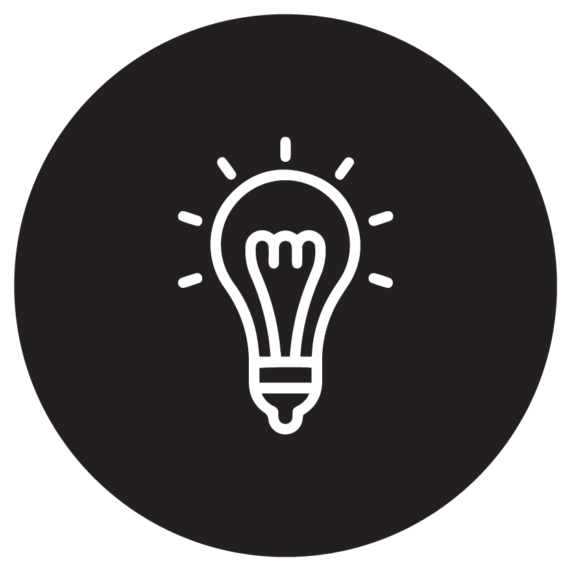 white icon of lightbulb and rays on black background