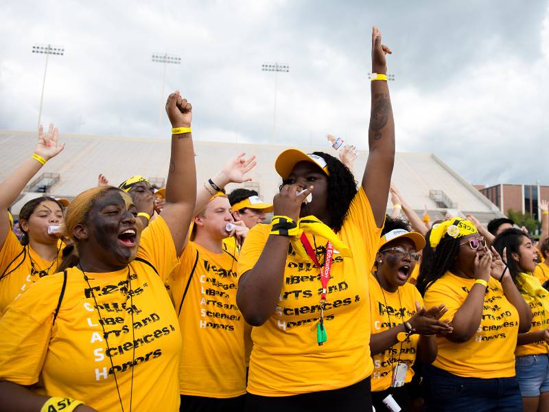 Students cheering on campus