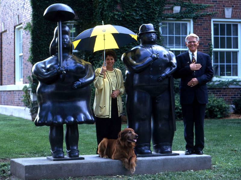Hughes with wife and dog