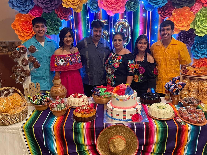 Image of six members of the Aranda family at a birthday party in Dodge City in 2021.
