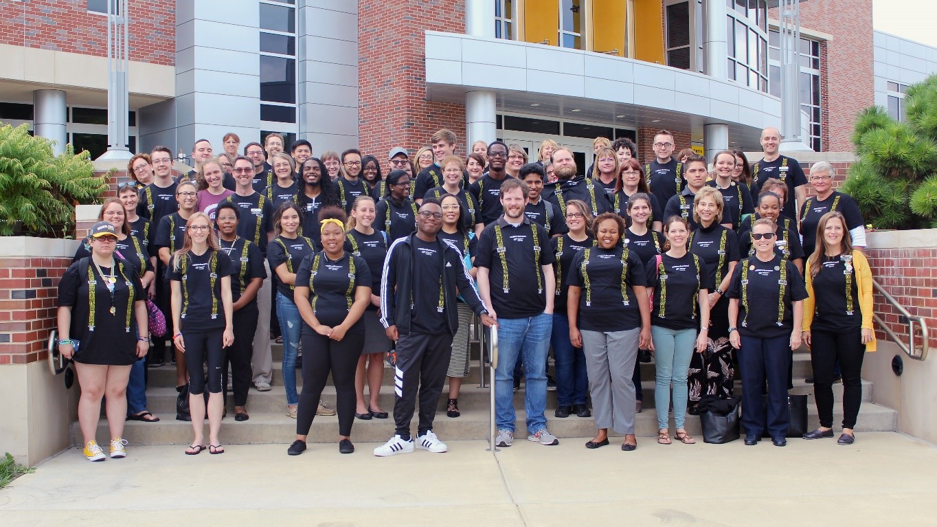 Image of members of CAPS posing outside at WSU campus.