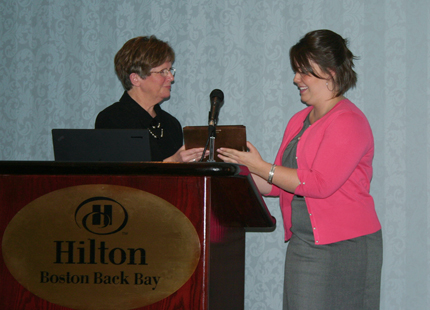 Mallory Jennings, right, accepts the Cooperative Education Student Achievement Award from WSU Cooperative Education and Work-Based Learning Director Connie Dietz on March 23 in Boston.