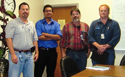 From left: Rob Cheney, Aakash Amatya, Gary Honomichl and Mark Stukey at the Coleman Co. in Wichita. Amatya worked with the Coleman Co. this past summer as an energy efficiency intern.