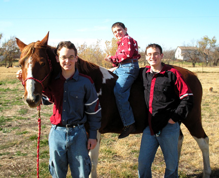 From left: Paul, John and Mark Vernacchia. Paul Vernacchia is 15 years old and is working toward a degree in accounting at Wichita State.