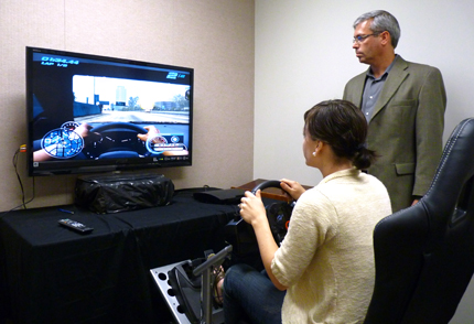 WSU psychology professor Alex Chaparro works with a student on a study he's doing on distracted drivers.