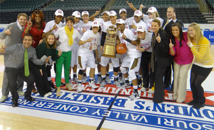 The WSU Women's Basketball Team celebrates after winning the Missouri Valley Conference Tournament Sunday.
