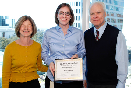 2000 graduate Nicole Stockdale recently received the Line Editor of the Year award at the Dallas Morning News. Pictured with her are Sharon Grigsby, deputy editorial page editor, and Bob Mong, editor.