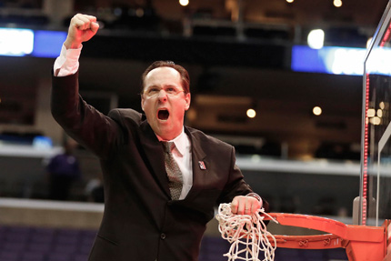 Shocker basketball coach Gregg Marshall cuts down the net as he celebrates the team's win over Ohio State to make it to the Final Four of the 2013 NCAA Tournament.