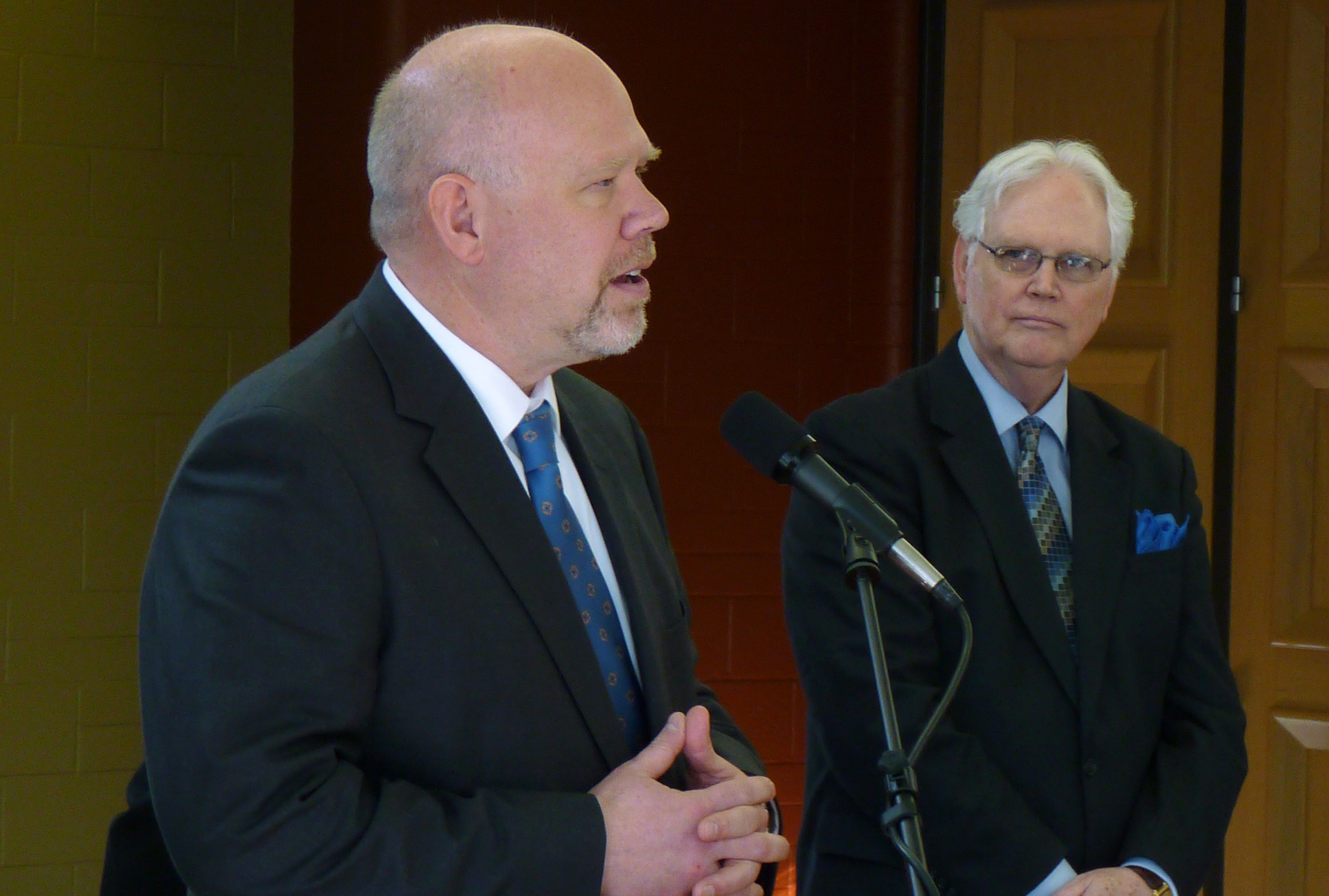 International opera star Alan Held, left, addresses the audience as WSU College of Fine Arts Dean Rodney Miller looks on. Held will join Wichita State University in fall as the Ann and Dennis Ross Faculty of Distinction in Opera.