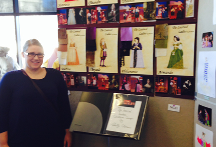 WSU student Shelby Clemens in front of her winning display at the Kennedy Center American College Theatre Festival.