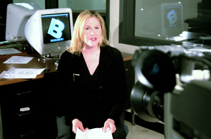 Rebecca Zepick films a live shot from the ESC newsroom during a Studio B broadcast.