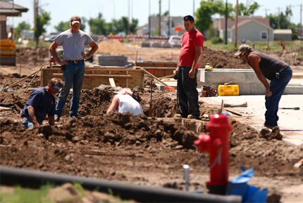 Workers begin the groundwork for the new business district on Main Street in Greensburg, Kan., which was almost entirely demolished in a 2007 tornado.
