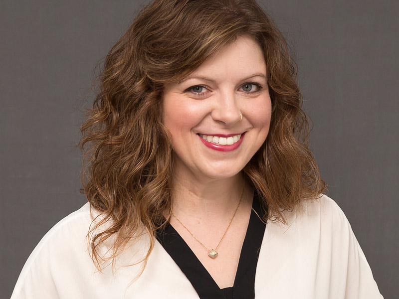 Jessica Miller smiling.