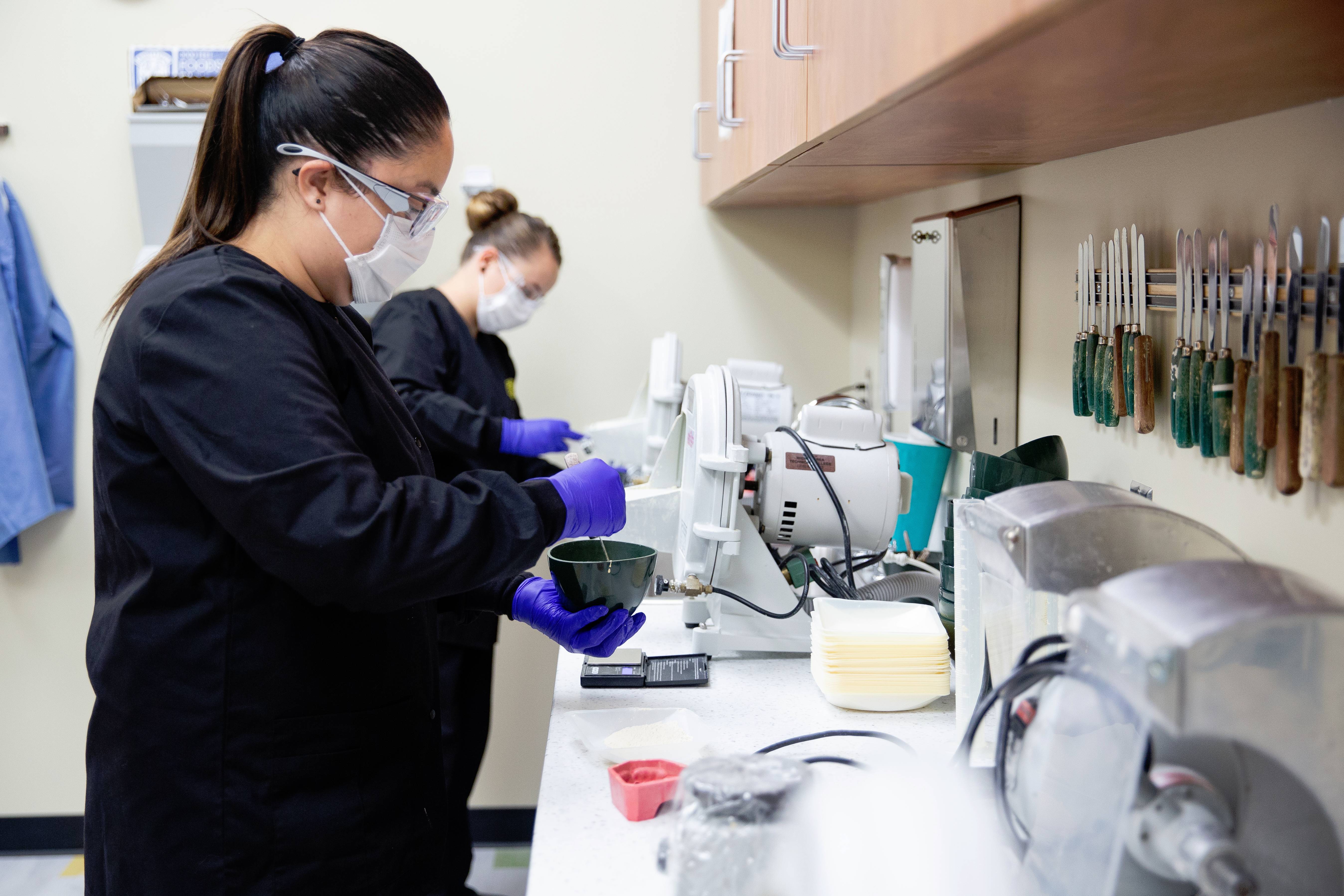 dental assistant students in lab