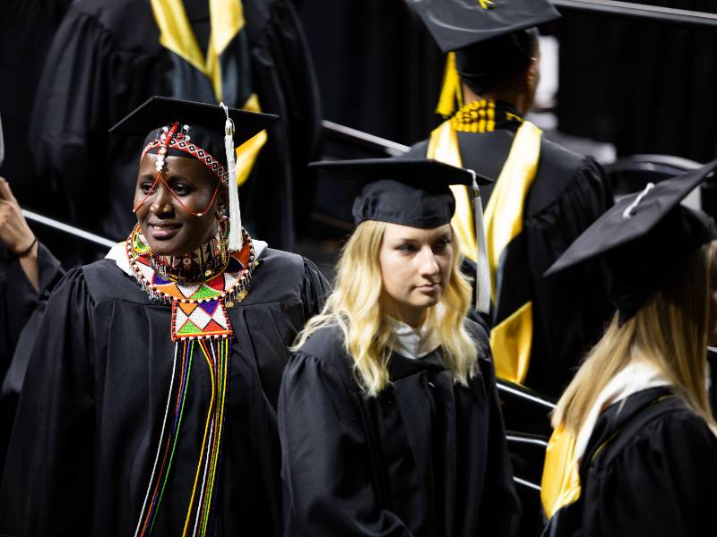 Two women graduation from WSU