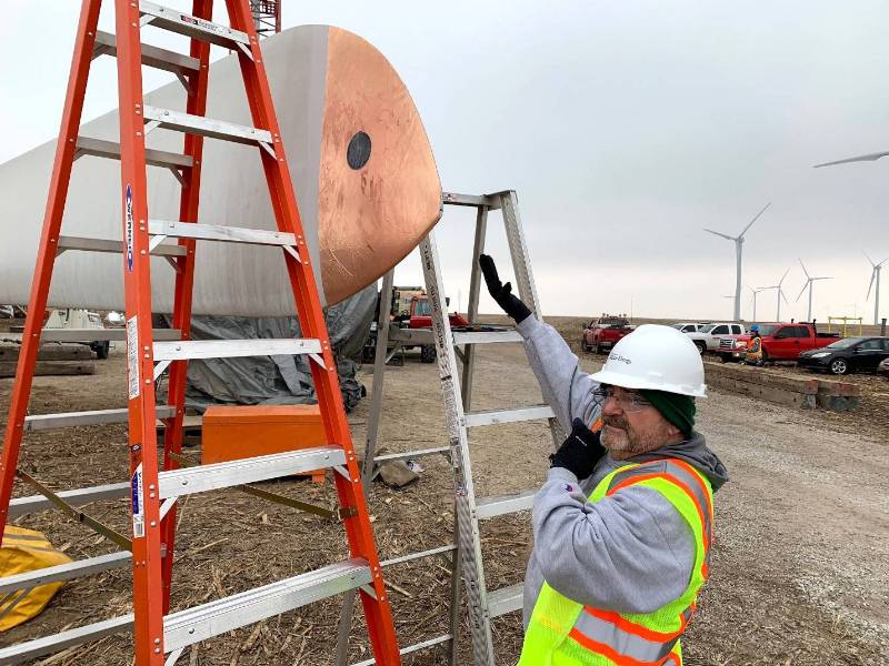 Billy Martin outside working on a wind turbine