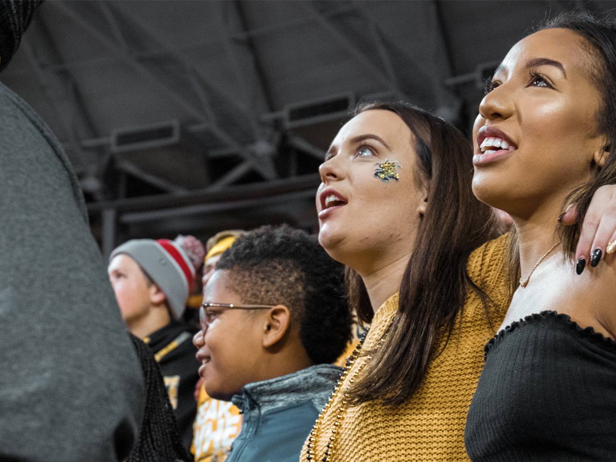 Shockers cheer the home team on in a men's basketball game