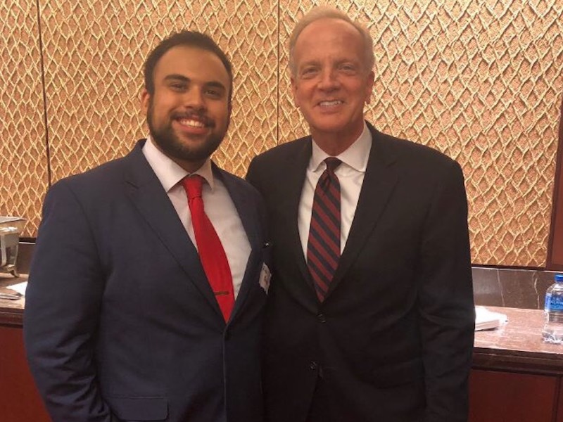 Wichita State senior Alejandro Arias Esparza (left) and Kansas senator Jerry Moran.