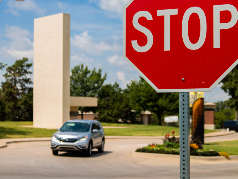 New stop signs facing Perimeter Road on Memorial Drive