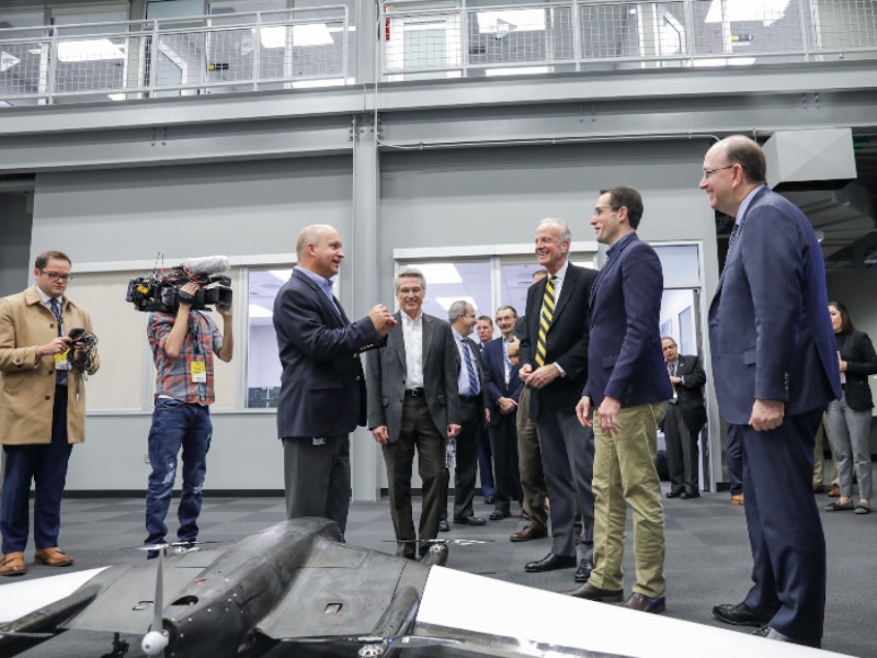 NIAR executive director John Tomblin leads a tour of what is now called the John Bardo Center with a group that includes Kansas senator Jerry Moran.