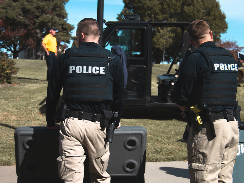 WSUPD officers passing out drinks at a pop-up picnic.