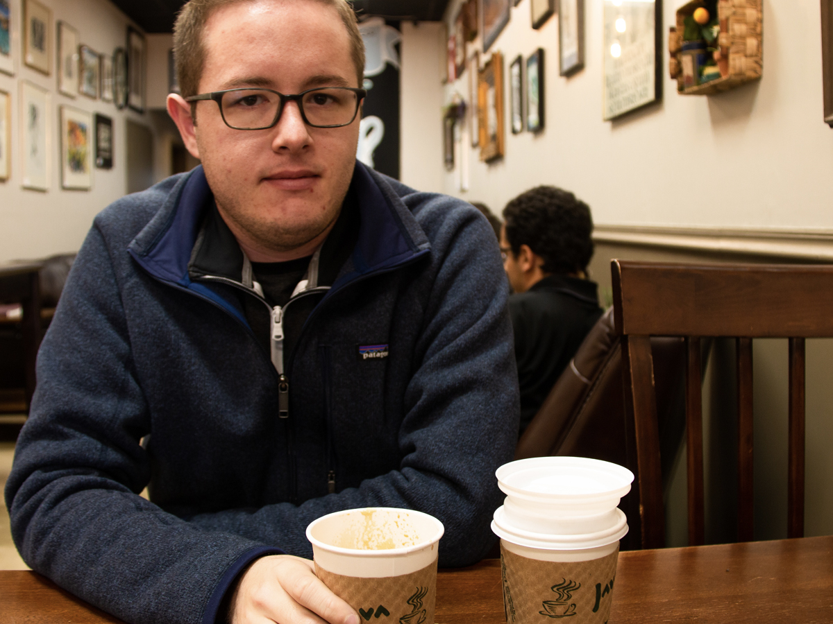Ryan Myers, graduate student and graduate assistant for Shocker Athletics enjoys a coffee at Il Primo