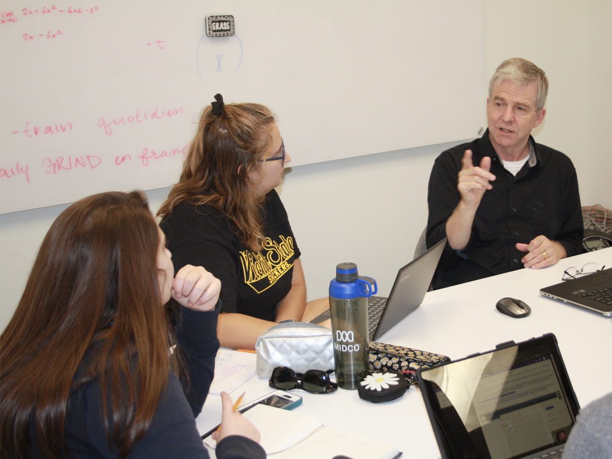 Martin Ratcliffe instructs students in an honors research group studying variable stars