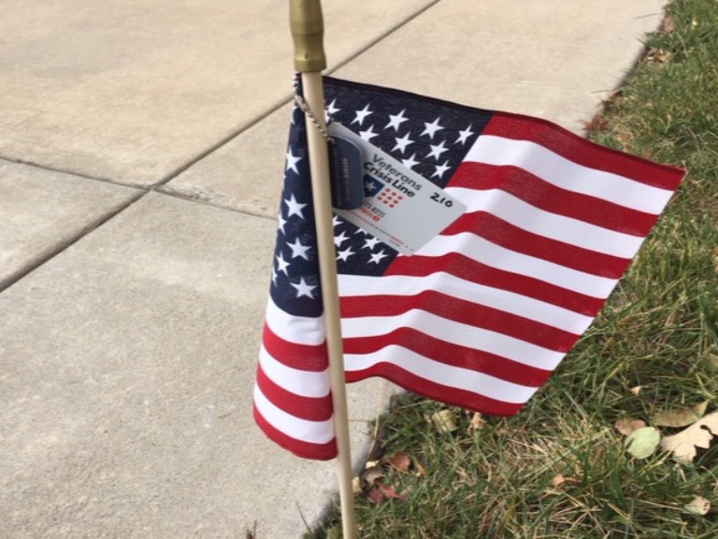 United States flag and crisis hotline card