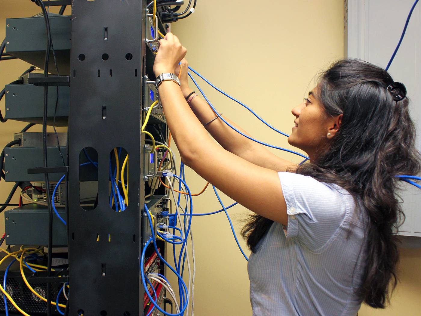 student working on equipment