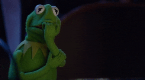 Kermit from the Muppets looking scared