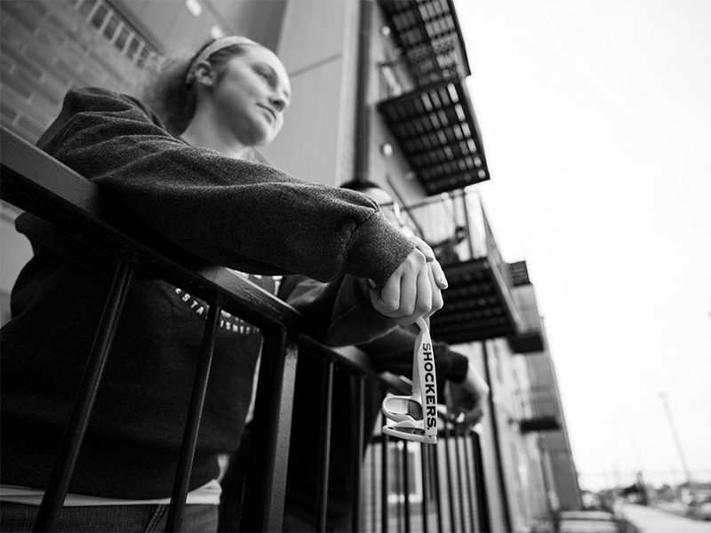 A student looking out across campus