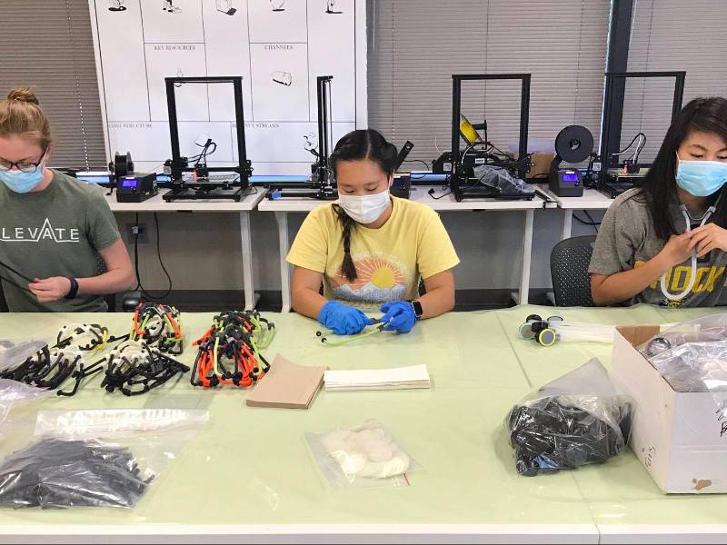 Students putting together PPE