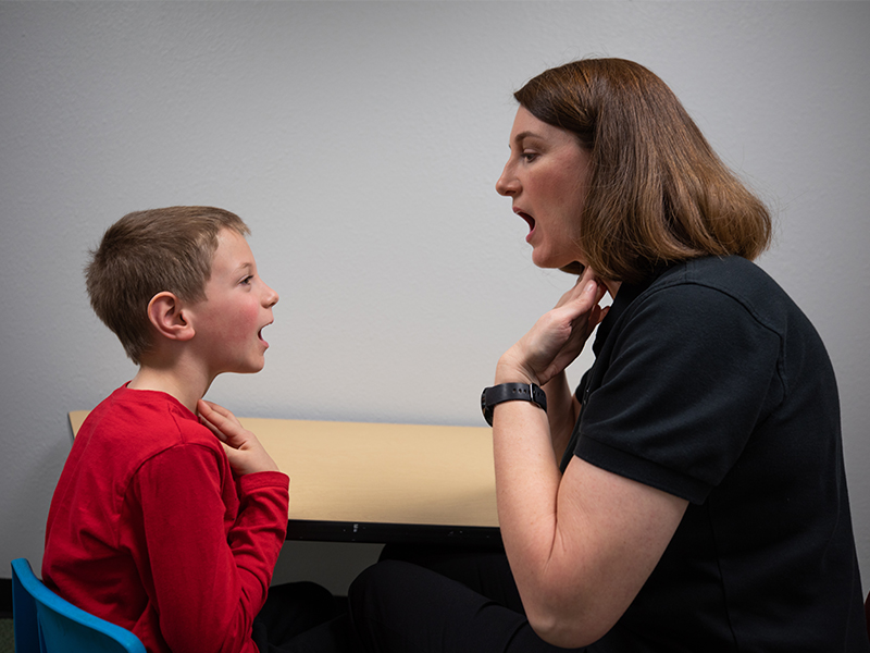 Speech-Language Pathologist working with child