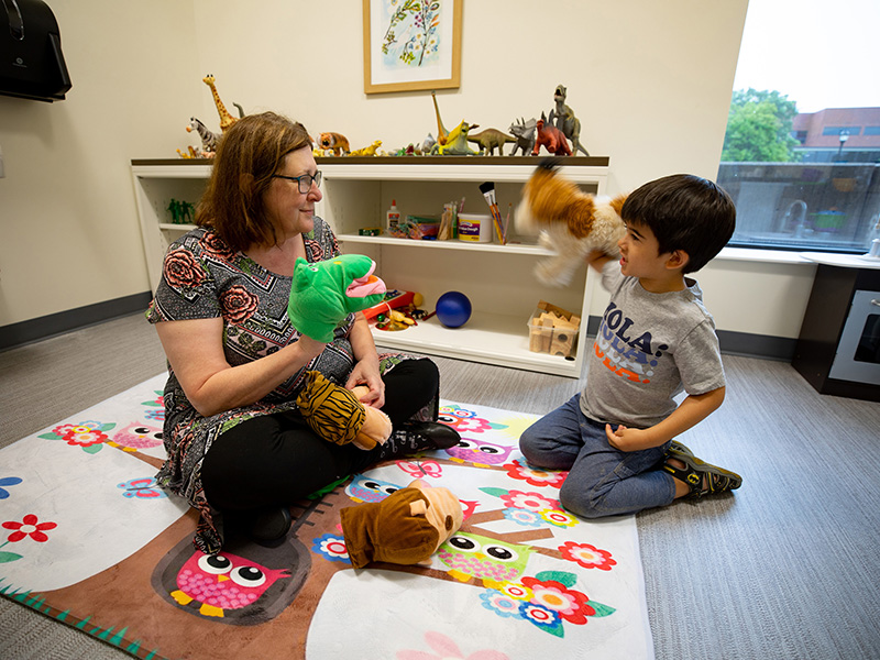 Dr. Jody Fiorini works with a client at the WISE Clinic. 