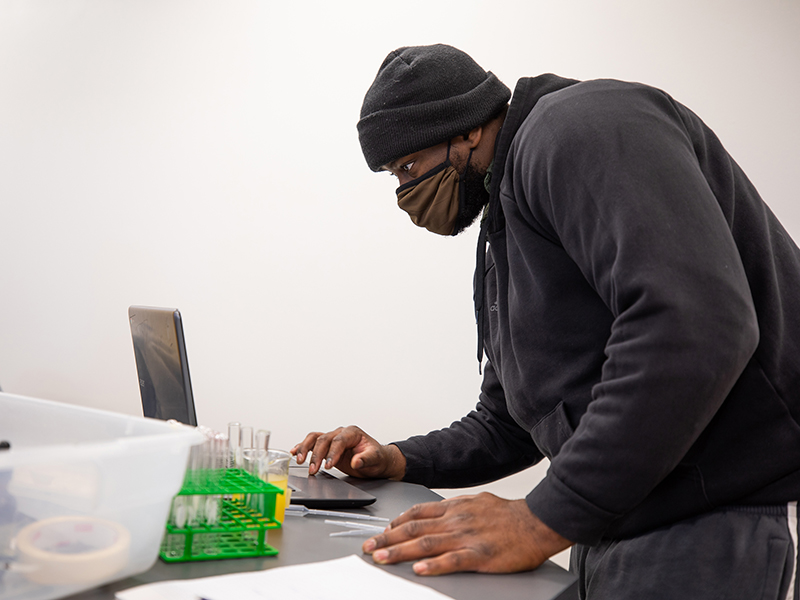 A student studies in the human organism lab.