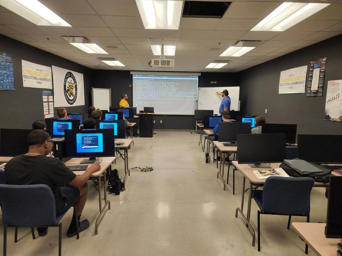 Engineering students work on computers