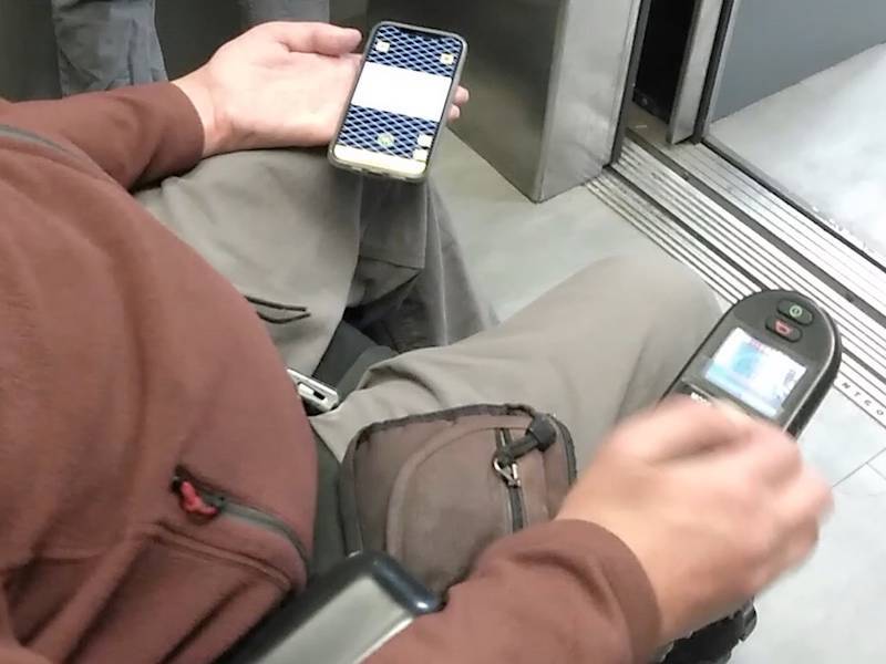 Wheelchair user in elevator