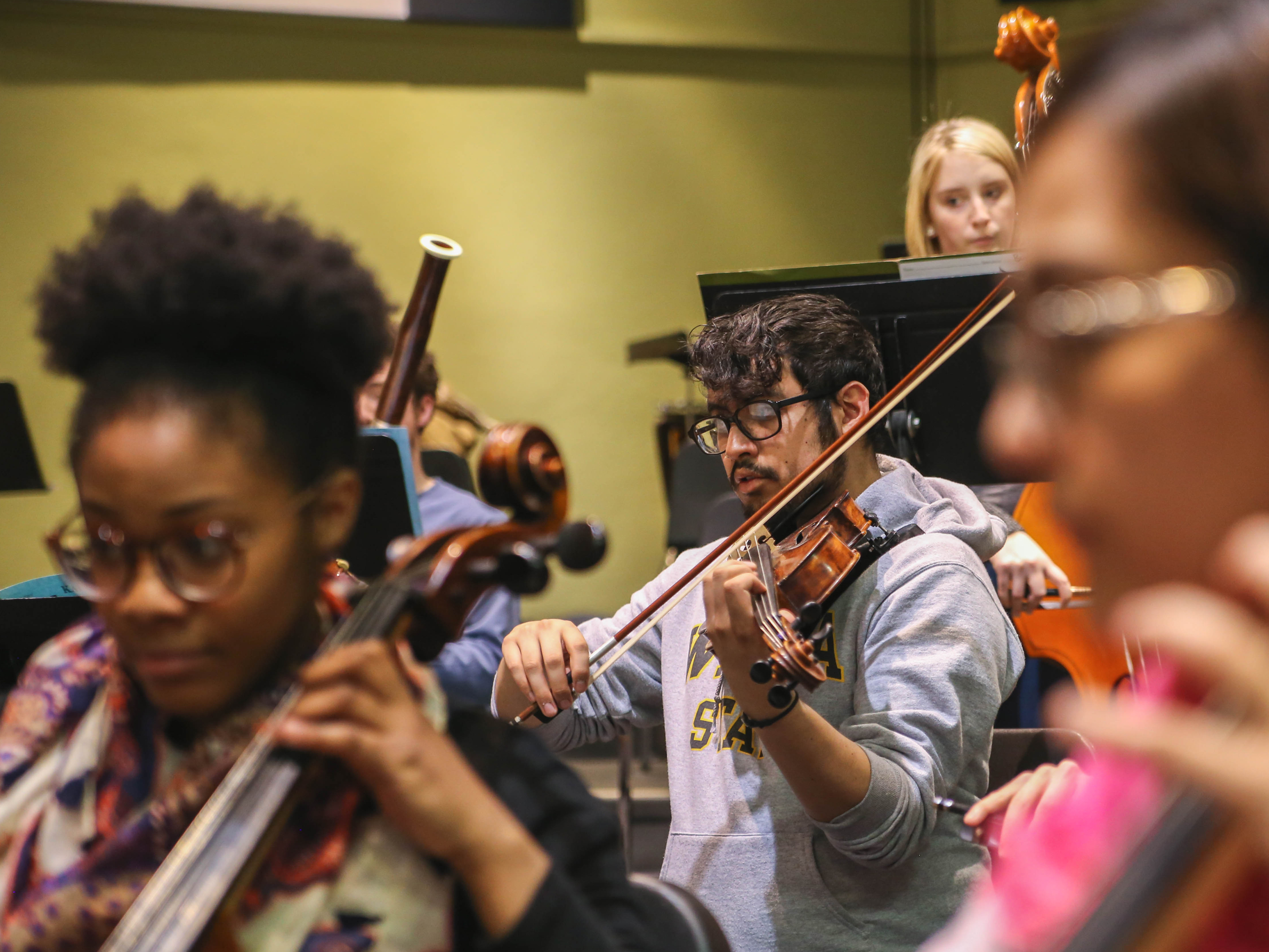 Students in orchestra practice